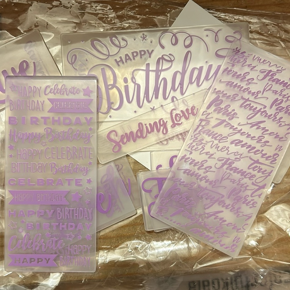 Assorted sentiment embossing folders